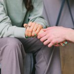 crop psychologist supporting patient during counseling indoors